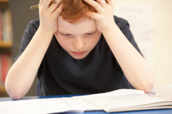 Struggling reader at desk