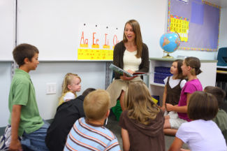 Teacher reading to class